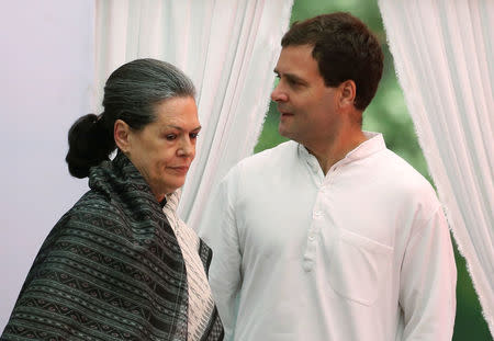 Congress party president Sonia Gandhi (L) and her son and the party's vice-president Rahul Gandhi arrive to address their supporters before what the party calls "Save Democracy" march to parliament in New Delhi, May 6, 2016. REUTERS/Altaf Hussain