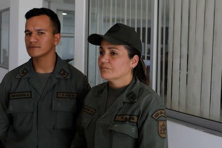 Venezuelan National Guards Rosales Jimenez and Kari Castro Marquez attend an interview with Reuters in Cucuta, Colombia February 24, 2019. Picture taken February 24, 2019. REUTERS/Marco Bello