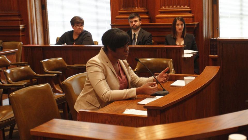 Heather Taylor, shown in this file photo testifying while as an officer in the St. Louis Metropolitan Police Department, is now studying for the LSATs in Florida. The former sergeant doesn't believe in defunding the police, but does believe in re-directing their tasks a bit. "What you have to do is retrain people and take away the jobs that are not law enforcement," she said. "Why are we doing traffic stops?"