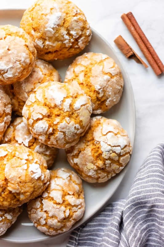 <p>Lavender and Macarons</p><p>You'll fall in love with these easy pumpkin crinkle cookies! Made with canned pumpkin puree and warming spices, these vegan crinkle cookies are perfect for fall baking. </p><p><strong>Get the recipe: <em><a href="https://www.lavenderandmacarons.com/pumpkin-crinkle-cookies/" rel="nofollow noopener" target="_blank" data-ylk="slk:Pumpkin Crinkle Cookies;elm:context_link;itc:0;sec:content-canvas" class="link rapid-noclick-resp">Pumpkin Crinkle Cookies</a></em></strong></p>