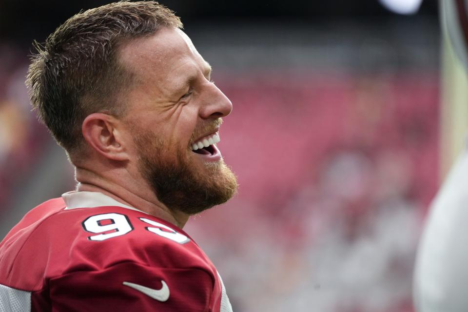 J.J. Watt laughs with his teammates during the Arizona Cardinals Back Together Saturday Practice on July 30 at State Farm Stadium in Glendale, Arizona.