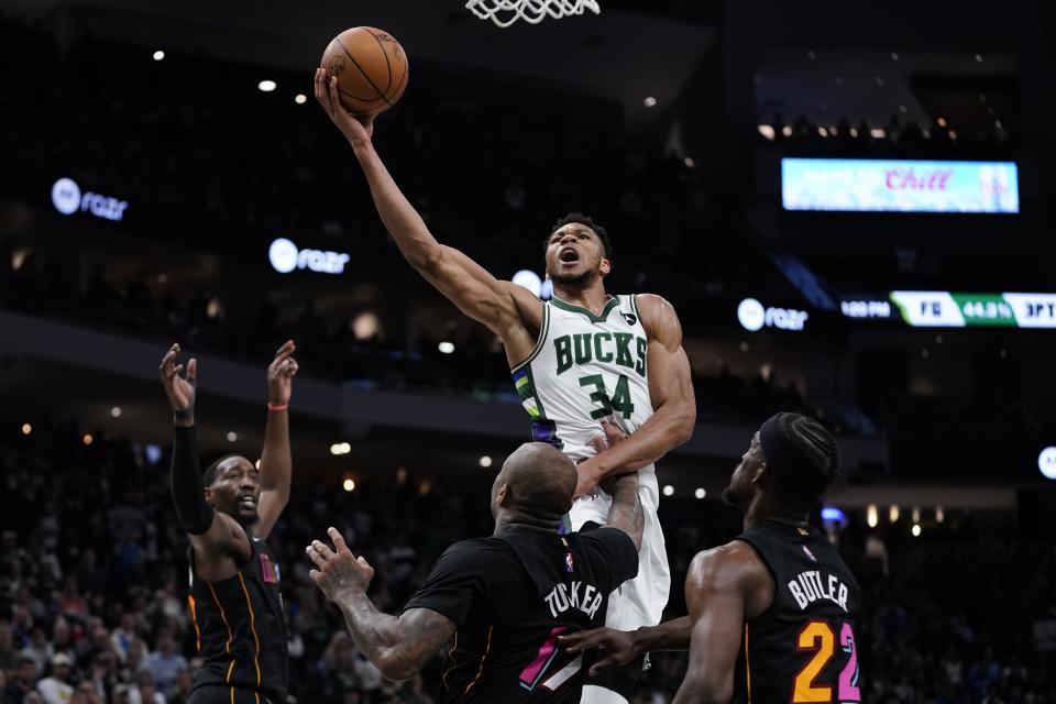 Milwaukee Bucks' Giannis Antetokounmpo shoots during the second half of an NBA basketball game against the Miami Heat Wednesday, March 2, 2022, in Milwaukee. The Bucks won 120-119. (AP Photo/Morry Gash)