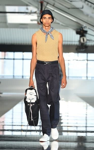 A model walks the runway during the BOSS Menswear SS18 show at Fulton Market Building on July 11, 2017 in New York City. - Credit: Getty