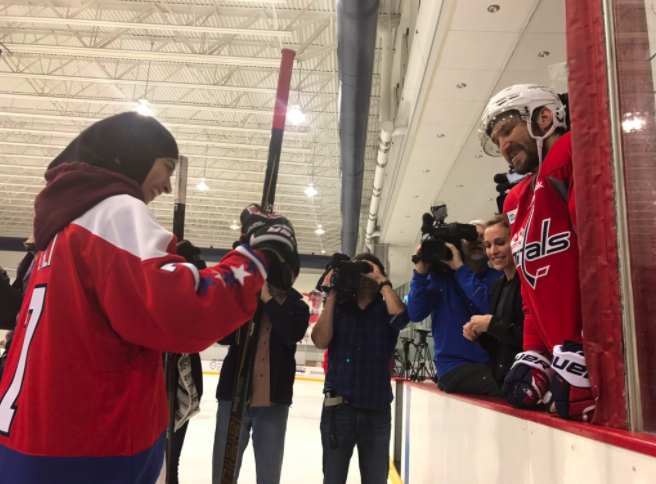 Photo of Fatima Al Ali and Alex Ovecgkin tweeted by Washington Capitals. 