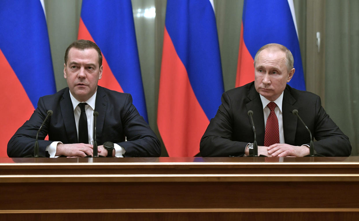 Russian President Vladimir Putin and Prime Minister Dmitry Medvedev attend a meeting with members of the government in Moscow, Russia January 15, 2020. Sputnik/Alexey Nikolsky/Kremlin via REUTERS  ATTENTION EDITORS - THIS IMAGE WAS PROVIDED BY A THIRD PARTY.