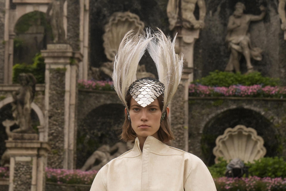 A model wears a creation as part of the women's Louis Vuitton Cruise 2024 collection, unveiled on Isola Bella (Bella Island) on Lake Maggiore in Stresa, northern Italy, Wednesday, May 24, 2023. (AP Photo/Antonio Calanni)