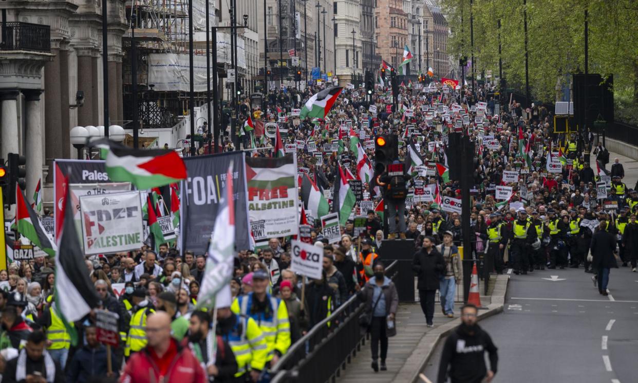 <span>Thousands march to Hyde Park during a demonstration in solidarity with Palestinians in London on Saturday.</span><span>Photograph: Anadolu/Getty Images</span>