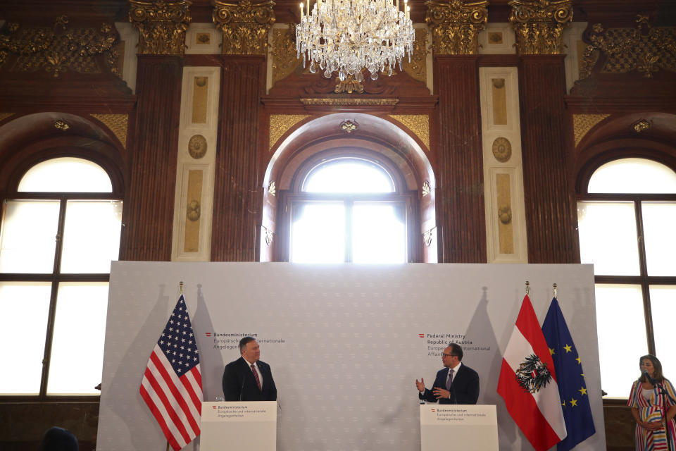 U.S. Secretary of State Mike Pompeo, left, holds a joint news conference with Austrian Foreign Minister Alexander Schallenberg in Vienna Austria, Friday Aug. 14, 2020. Pompeo is on a five-day visit to central Europe. (Lisi Niesner/Pool via AP)