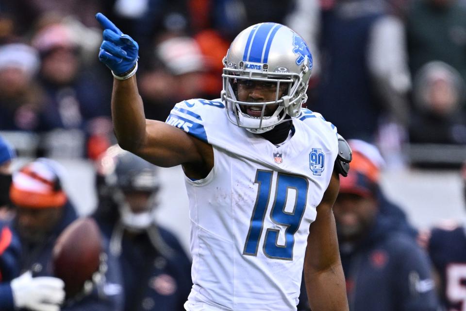 Lions wide receiver Donovan Peoples-Jones signals for a first down after picking up the needed yards on fourth down in the first half on Sunday, Dec. 10, 2023, in Chicago.