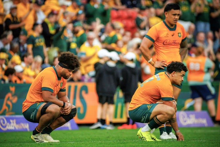 (From left) Rob Valetini, Hunter Paisami and Len Ikitau look dejected after Australia's Rugby Championship loss to South Africa, whose coach Rassie Erasmus expects a challenge from the Wallabies in the return match next weekend (Patrick HAMILTON)