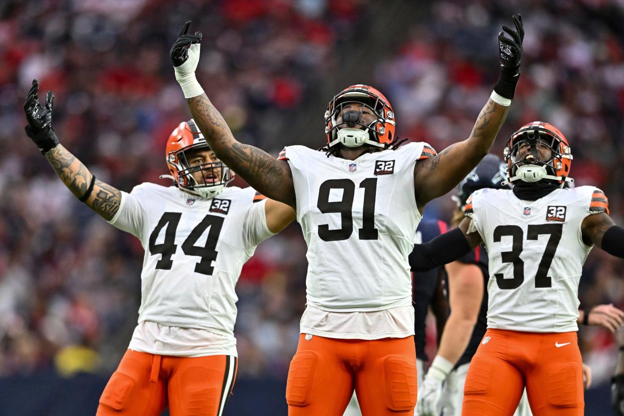 Cleveland Browns defensive end Alex Wright (91) reacts against the Houston Texans on Dec 24, 2023, in Houston.
