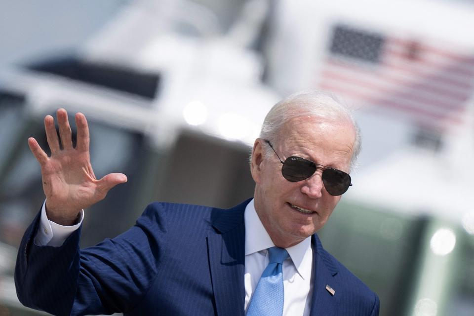 President Joe Biden walks to board Air Force One at Joint Base Andrews in Maryland on Wednesday. Biden will cut short a major trip to Asia, returning on Sunday, to Washington for high-stakes negotiations with Republicans to avert a debt default, according to two people familiar with his plans. Biden has cancelled planned stops in Australia and Papua New Guinea, but still intends to attend the upcoming G7 meeting in Japan.