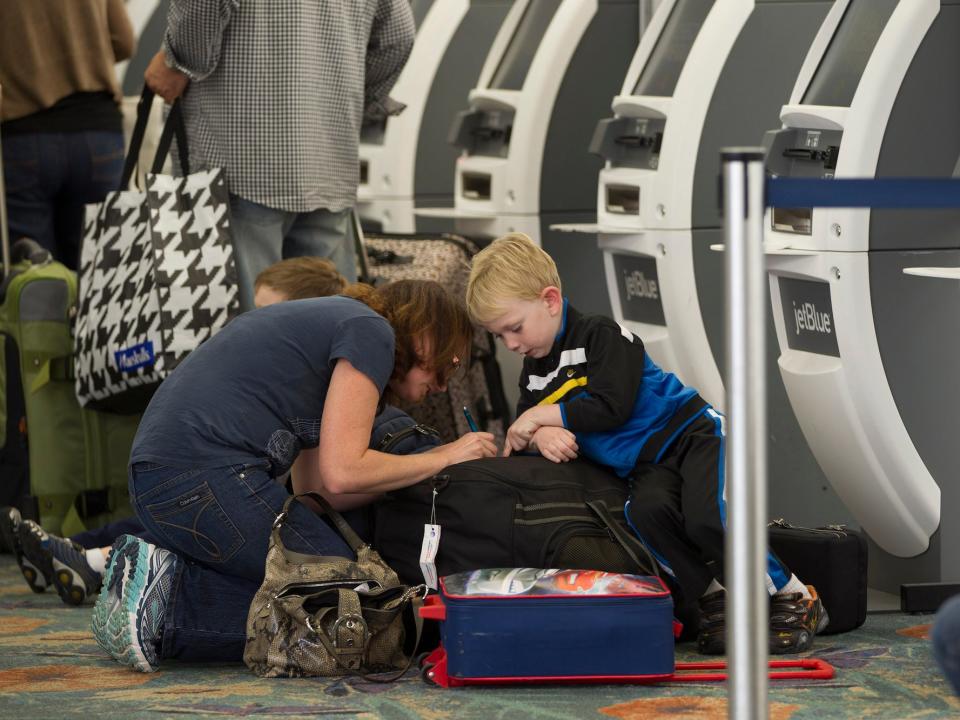 woman and child at airport