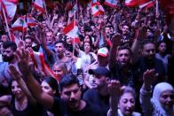 Demonstrators chant slogans during an anti-government protest in downtown Beirut