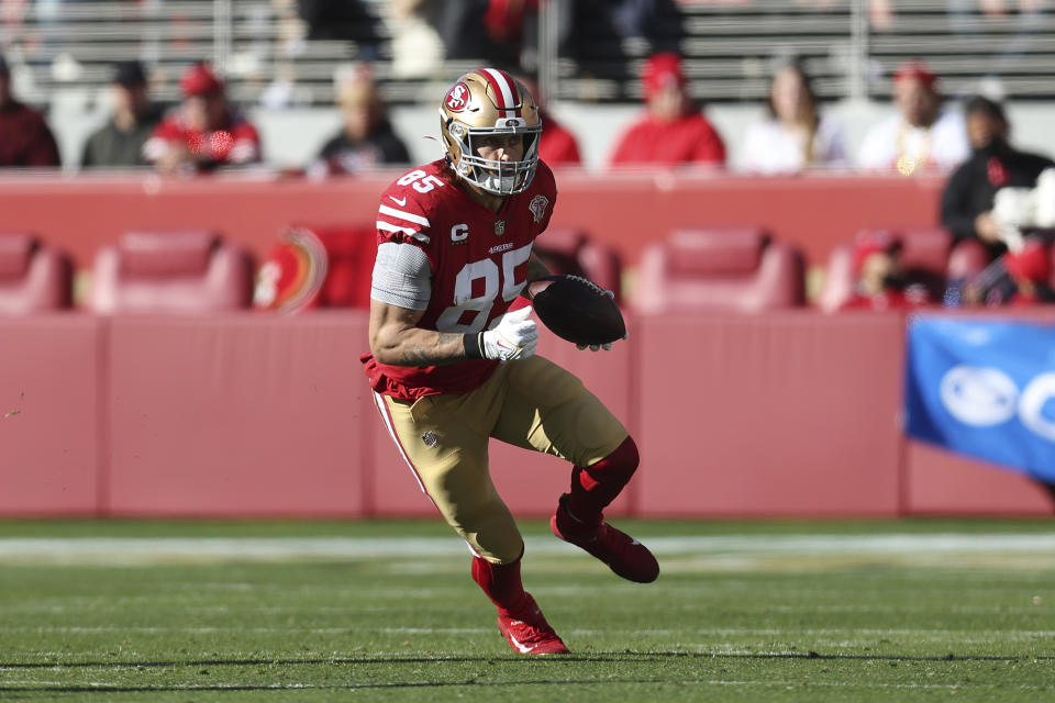 FILE - San Francisco 49ers tight end George Kittle (85) runs against the Houston Texans during the first half of an NFL football game on Jan. 2, 2022, in Santa Clara, Calif. Kittle and many of the NFL’s tight ends will gather in June, 2022, for the second Tight End University camp. (AP Photo/Jed Jacobsohn, File)