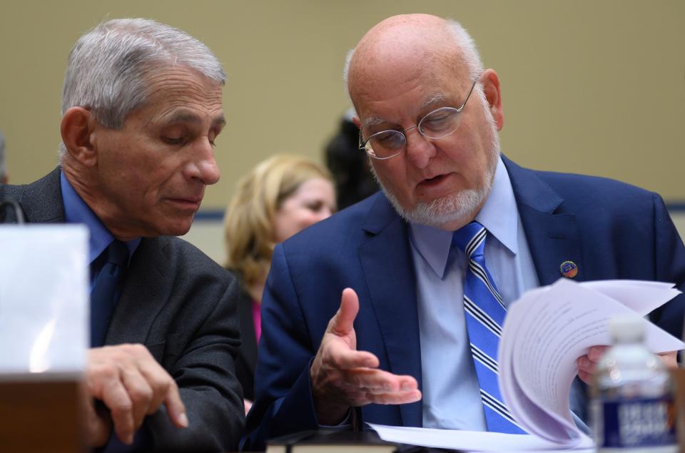 Dr. Anthony Fauci, director of the National Institute of Allergy and Infectious Diseases at National Institutes of Health, and Dr. Robert Redfield, director of the Centers for Disease Control and Prevention, at the start of Wednesday's hearing concerning government response to the coronavirus. (Photo: ANDREW CABALLERO-REYNOLDS via Getty Images)