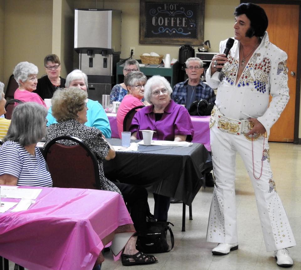 Eric Bressi, billed as Elvis' Lost Brother, performed a tribute show to Elvis Presley Wednesday, the anniversary of Presley's death, at the Coshocton Senior Center.