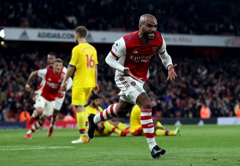 Alexandre Lacazette celebrates scoring Arsenal's equaliser (REUTERS)