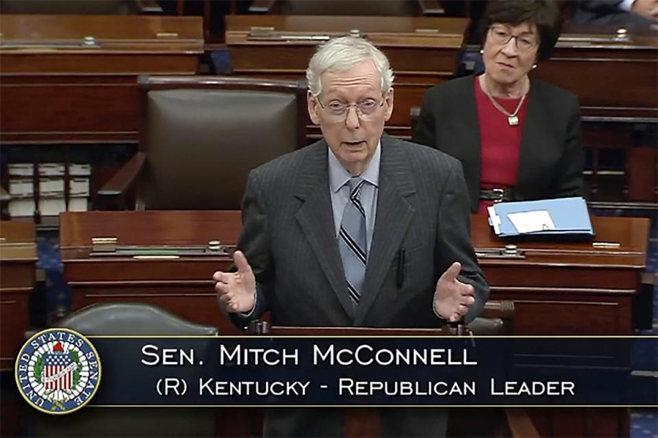 Mr McConnell speaking on the Senate floor, and telling his colleagues he’ll step down in November (AP)
