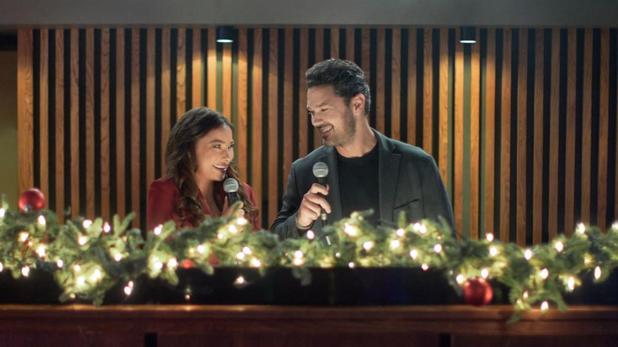 under the christmas sky astrophysicist, kat and by the books david are forced to work on a planetarium exhibit opening right before christmas will the stars align to bring these two together at the holidays photo jessica parker kennedy, ryan paevey