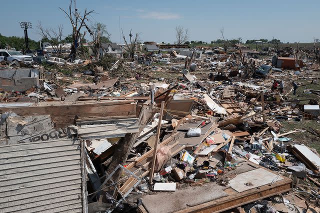 <p>Scott Olson/Getty</p> Greenfield, Iowa after the tornado on May 22, 2024