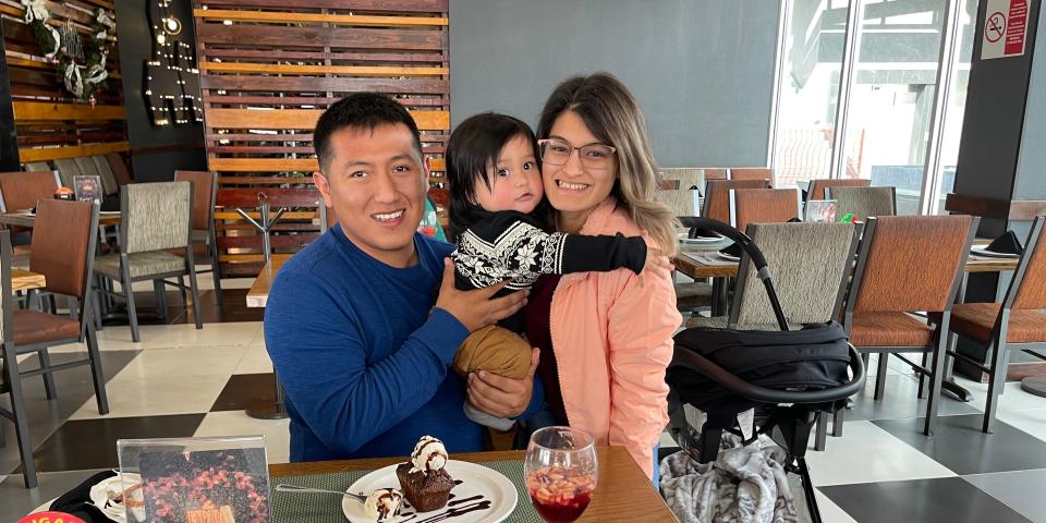 Jaime Avalos, Yarianna Martinez, and their son Noah pose for a photo.