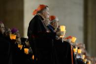 Bishops and cardinals attend a prayer vigil on the eve of the XIV General Assembly of the Synod of Bishops at St Peter's basilica on October 3, 2015 at the Vatican