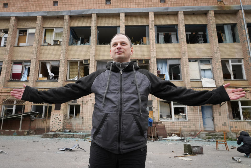 Maxim Shevchuk, the deputy head of the state agency managing the Chernobyl exclusion zone, talks near a building looted by Russian troops adjacent to the Chernobyl nuclear power plant near Chernobyl, Ukraine, Saturday, April 16, 2022. Thousands of tanks and troops rumbled into the forested exclusion zone around the shuttered plant in the earliest hours of Russia’s invasion of Ukraine in February, churning up highly contaminated soil from the site of the 1986 accident that was the world's worst nuclear disaster. (AP Photo/Efrem Lukatsky)