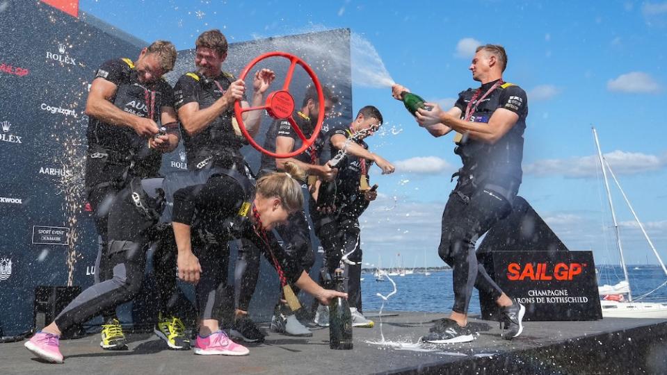 The Australian team celebrates in traditional yachting fashion after winning the Danish series. - Credit: Courtesy SailGP