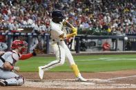 Milwaukee Brewers' Andrew McCutchen hits an RBI double during the fifth inning of a baseball game against the St. Louis Cardinals Wednesday, June 22, 2022, in Milwaukee. (AP Photo/Morry Gash)