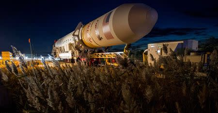 The Orbital Sciences Corporation Antares rocket, with the Cygnus spacecraft onboard, arrives at launch Pad-0A at NASA's Wallops Flight Facility in Virginia, in this October 24, 2014 handout photo provided by NASA. REUTERS/Joel Kowsky/NASA/Handout via Reuters