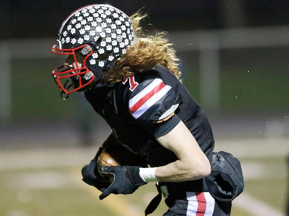 Crestview High School's Caden Cunningham (7) runs in for a touchdown on a pass reception from Hayden Kuhn in the first quarter against Columbia High School during their OHSAA Division VI regional semifinal high school football game at Medina High School's Ken Dukes Stadium Saturday, Nov. 12, 2022. TOM E. PUSKAR/ASHLAND TIMES-GAZETTE