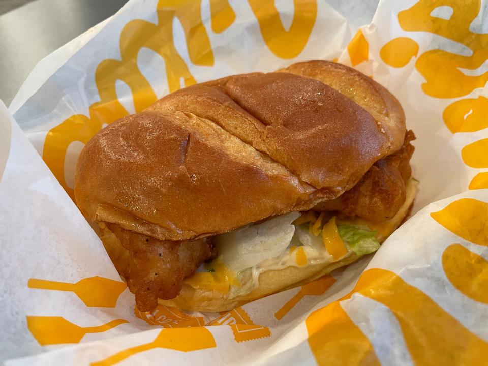 The North Atlantic cod filet sandwich is hand-battered and cooked to order, has tarter sauce, crisp lettuce Wisconsin cheddar and is served on a lightly buttered, toasted hoagie roll.