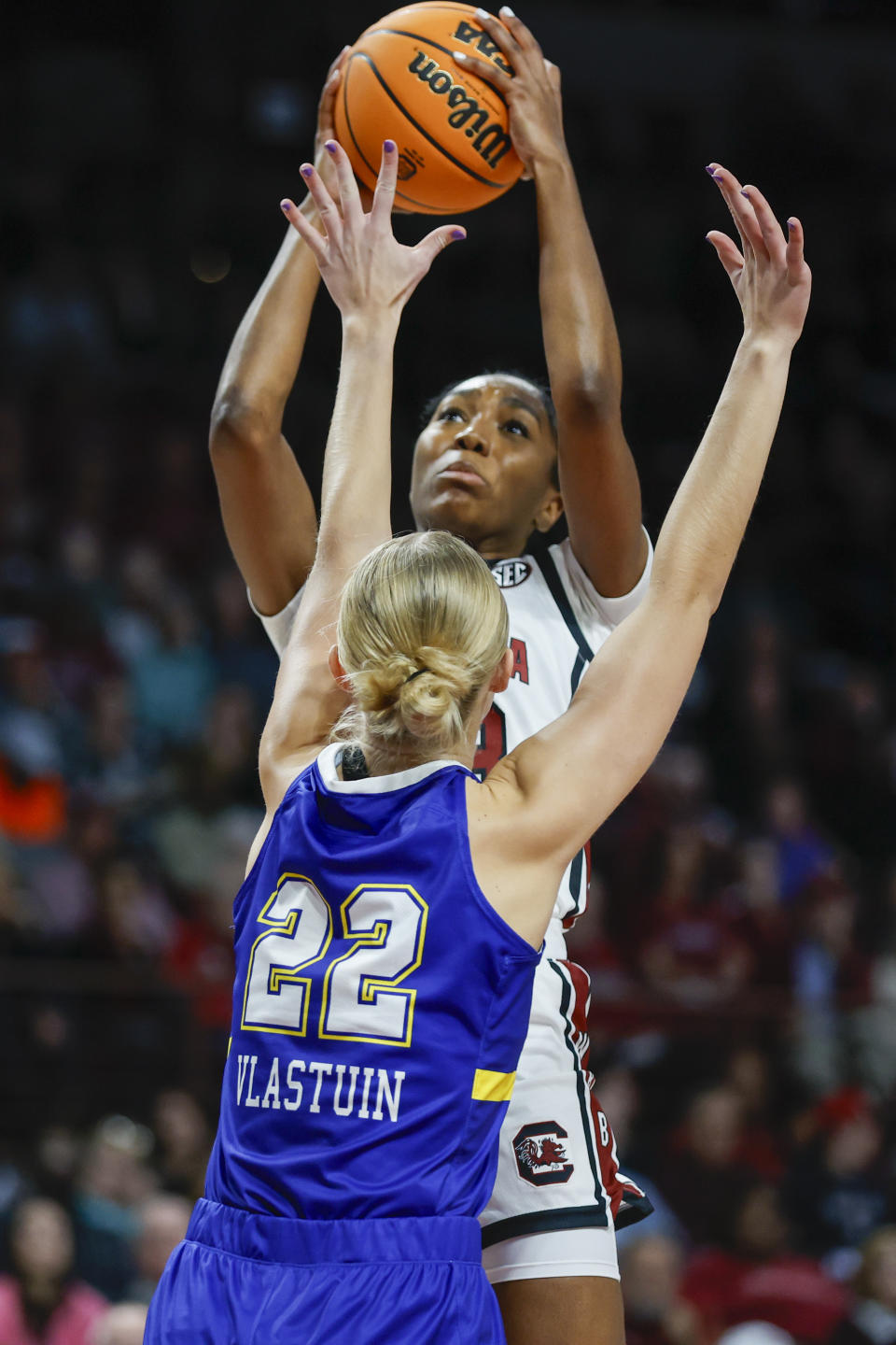 South Carolina guard Bree Hall, top, shoots over South Dakota State forward Madysen Vlastuin (22) during the first half of an NCAA college basketball game in Columbia, S.C., Monday, Nov. 20, 2023. (AP Photo/Nell Redmond)