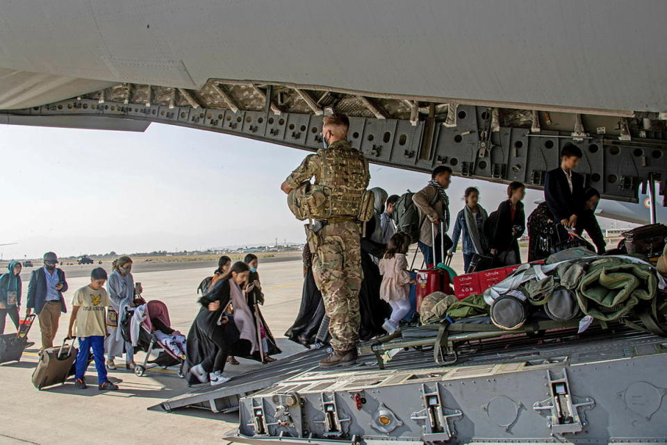 British citizens and dual nationals residing in Afghanistan board a military plane for evacuation from Kabul airport. (Ben Shread/UK MOD Crown copyright 2021/Handout via Reuters)