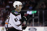 Arizona Coyotes defenseman Dysin Mayo reacts after scoring a goal against the New Jersey Devils during the second period of an NHL hockey game Wednesday, Jan. 19, 2022, in Newark, N.J. (AP Photo/Adam Hunger)