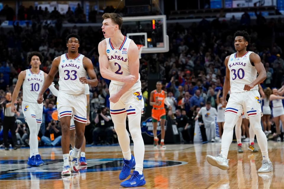 Kansas' Christian Braun reacts during the second half of a college basketball game in the Elite 8 round of the NCAA tournament Sunday, March 27, 2022, in Chicago.