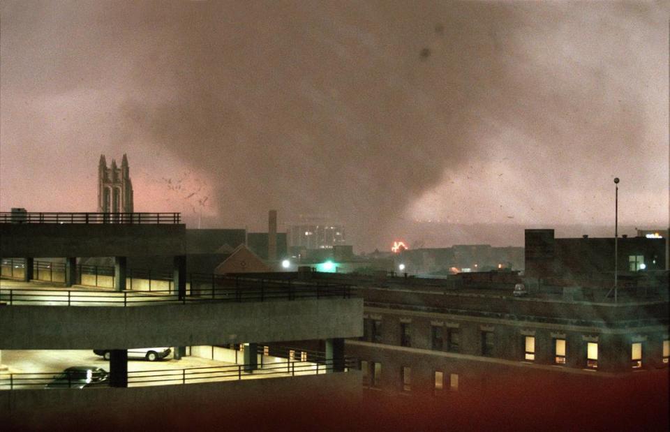 A tornado crosses the Trinity River on the west side of Fort Worth and heads for downtown on March 28, 2000.