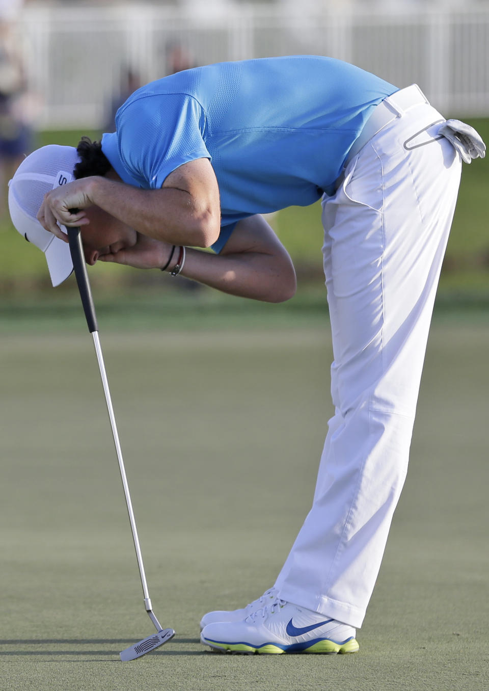 Rory McIlroy, of Northern Ireland, reacts after missing a putt on the 16th hole during the final round of the Honda Classic golf tournament, Sunday, March 2, 2014 in Palm Beach Gardens, Fla. (AP Photo/Wilfredo Lee)