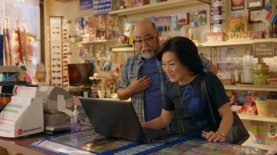 Kim and his wife in the store