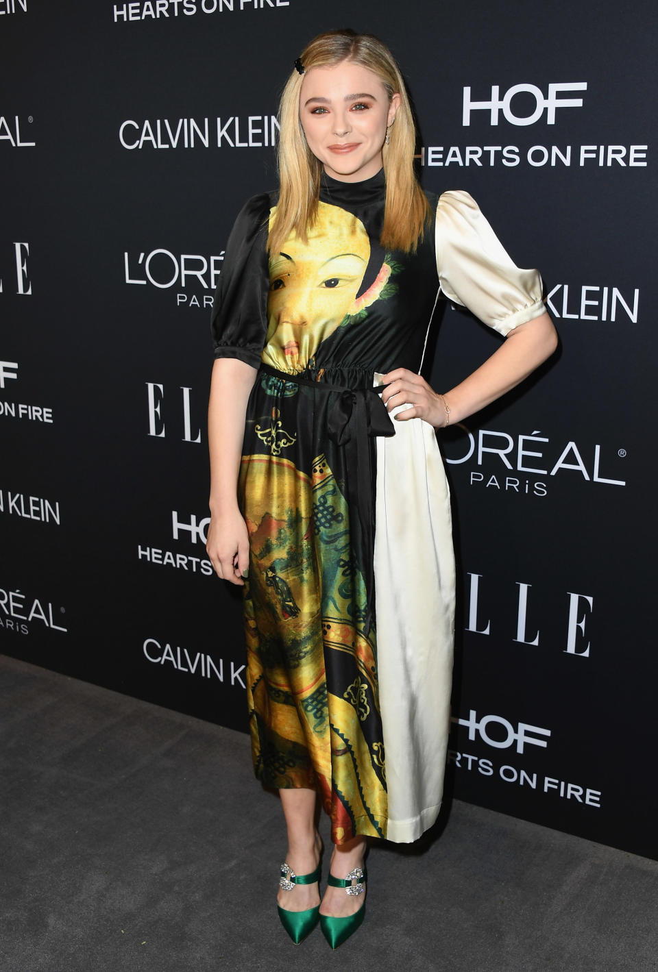 <p>Chloë Moretz won the red carpet at this year’s Elle Women in Hollywood Celebration courtesy of a printed Simone Rocha dress. Erm, who else is seriously tempted to trial the hair barrette trend now? <em>[Photo: Getty]</em> </p>