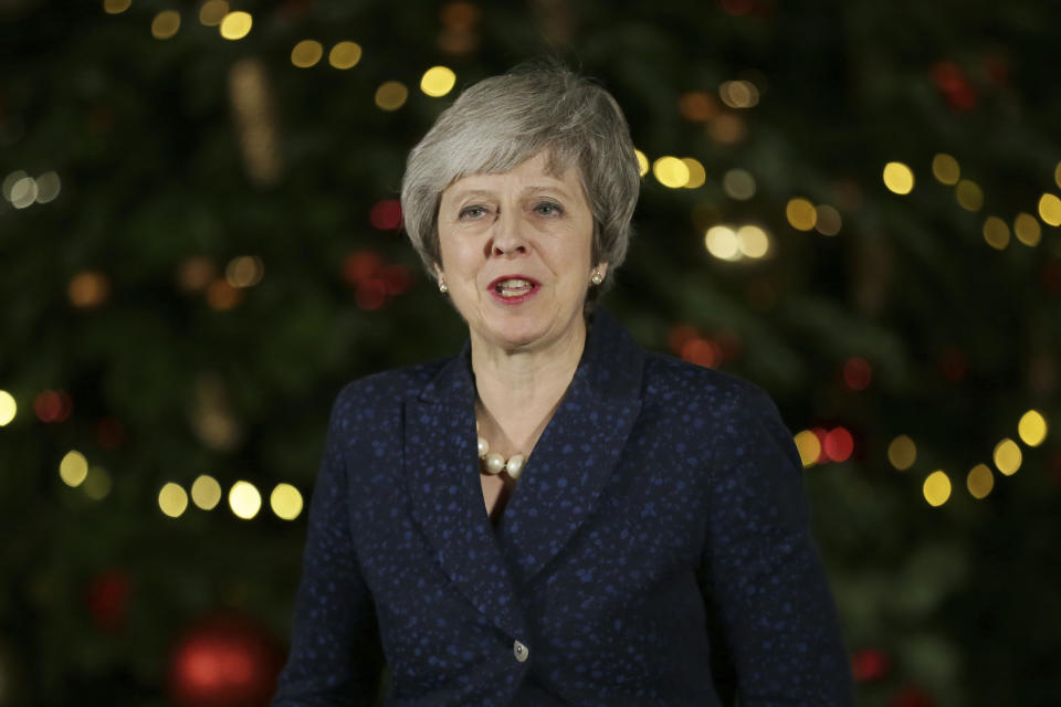 British Prime Minister Theresa May makes a statement outside 10 Downing Street, in London, Wednesday December 12, 2018. British Prime Minister Theresa May survived a brush with political mortality Wednesday, winning a no-confidence vote of her Conservative lawmakers that would have ended her leadership of party and country (AP Photo/Tim Ireland)