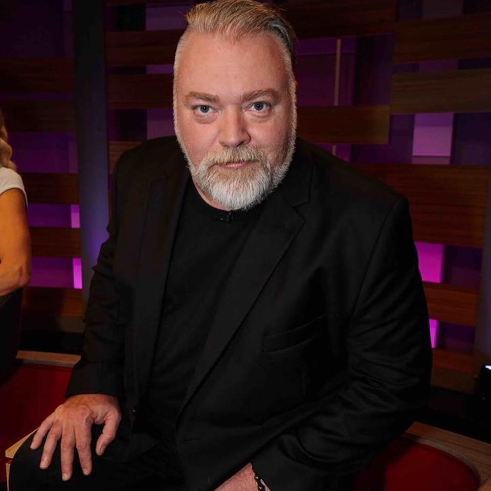 Kyle Sandilands poses for a photo at a KIIS FM event.