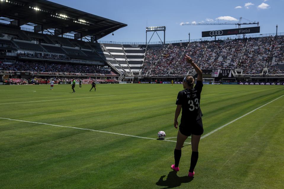 Washington Spirit forward and former BYU star <a class="link " href="https://sports.yahoo.com/soccer/players/1803619" data-i13n="sec:content-canvas;subsec:anchor_text;elm:context_link" data-ylk="slk:Ashley Hatch;sec:content-canvas;subsec:anchor_text;elm:context_link;itc:0">Ashley Hatch</a> takes a corner kick during an NWSL soccer match against the San Diego Wave on Saturday, May 6, 2023, in Washington. Hatch is hoping to earn a roster spot on this year’s U.S. World Cup team. | Nathan Howard, Associated Press