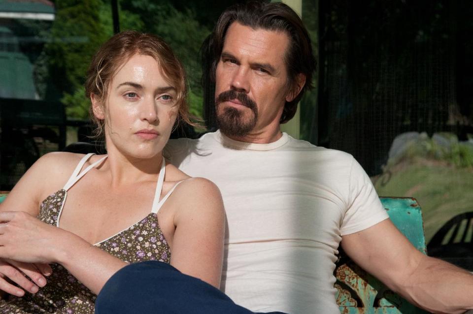 This image released by Paramount Pictures shows Kate Winslet, left, Josh Brolin in a scene from "Labor Day." Winslet's recent filmography is doted with memorable mothers: "Mildred Pierce," "Carnage," "Revolutionary Road," and "Little Children." She adds another portrait of motherhood with "Labor Day," which she discussed in an interview before giving birth to her third child. (AP Photo/Paramount Pictures, Dale Robinette)
