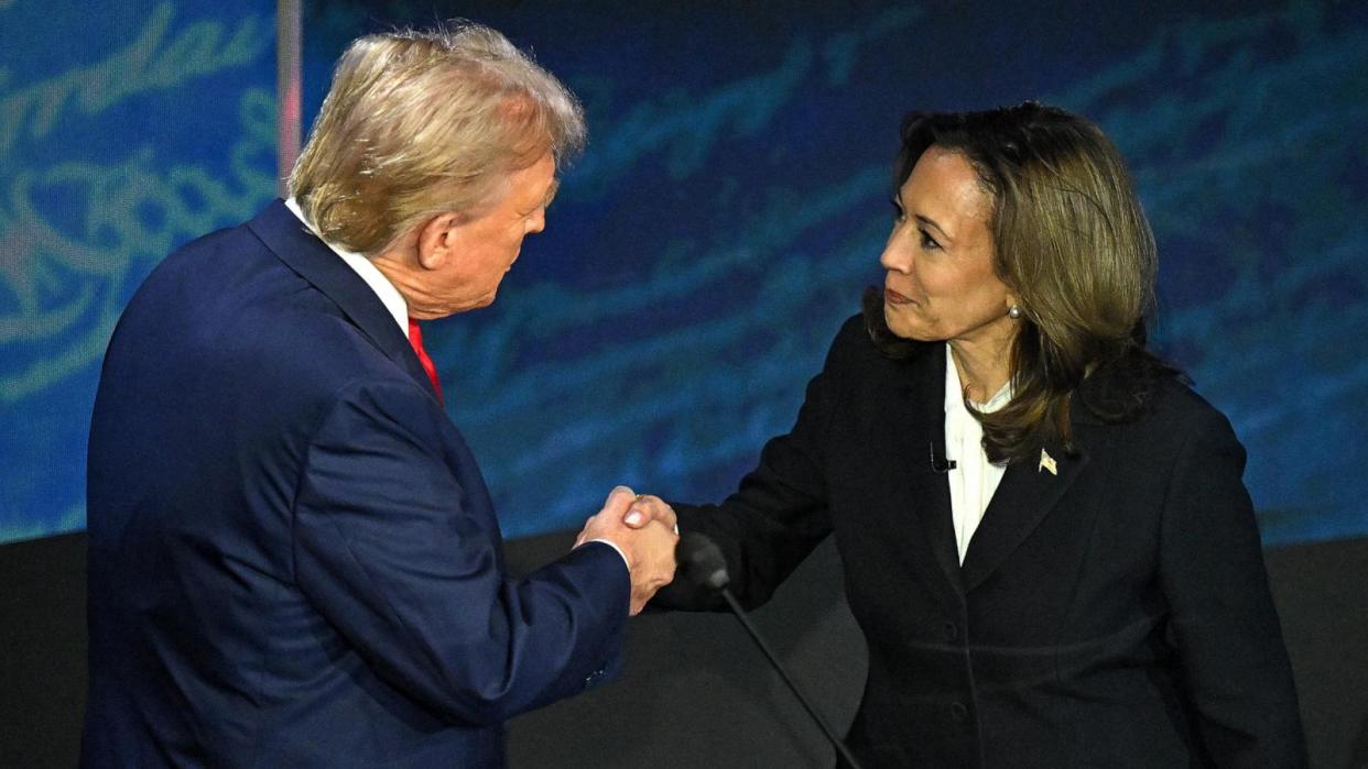 PHOTO: Vice President and Democratic presidential candidate Kamala Harris (R) shakes hands with former President and Republican presidential candidate Donald Trump during a presidential debate in Philadelphia, on Sept. 10, 2024.  (Saul Loeb/AFP via Getty Images)