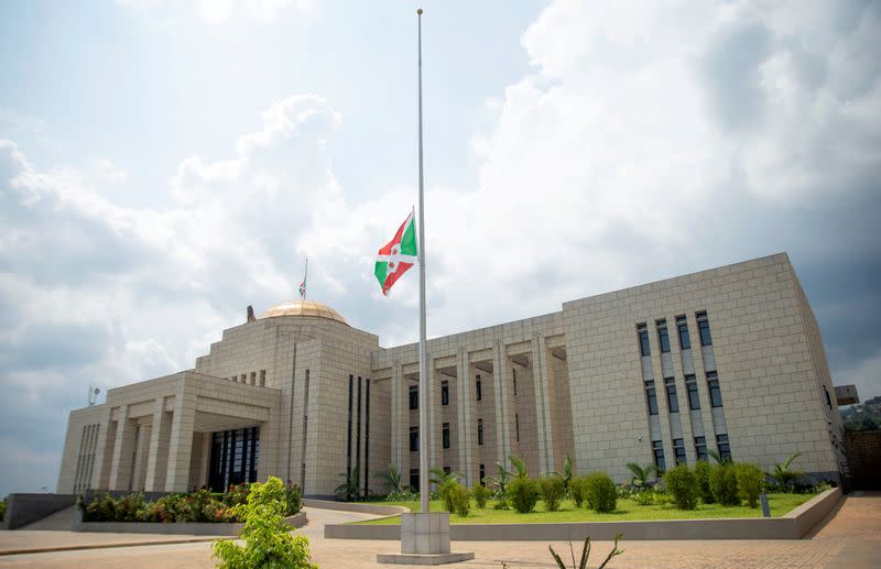 FILE PHOTO: The Burundian national flag flies at half mast outside the State House building following the death of Burundi's President Pierre Nkurunziza, in Bujumbura