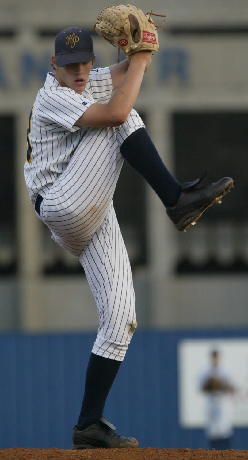 Highland Park's starting pitcher Clayton Kershaw winds up to throw against Arlington Martin in 2005.