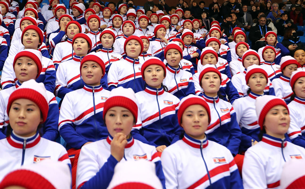 North Korean cheerleaders wave the Korean Unification flag during the Pair Skating Free Skating at Gangneung Ice Arena on February 15, 2018 in Gangneung, South Korea. (Getty Images)