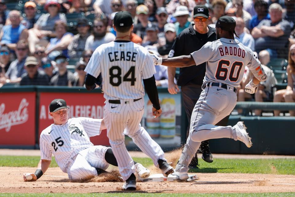 Chicago White Sox first baseman Andrew Vaughn beats Detroit Tigers left fielder Akil Baddoo to first base for an out during the first inning at Guaranteed Rate Field, June 3, 2023 in Chicago.